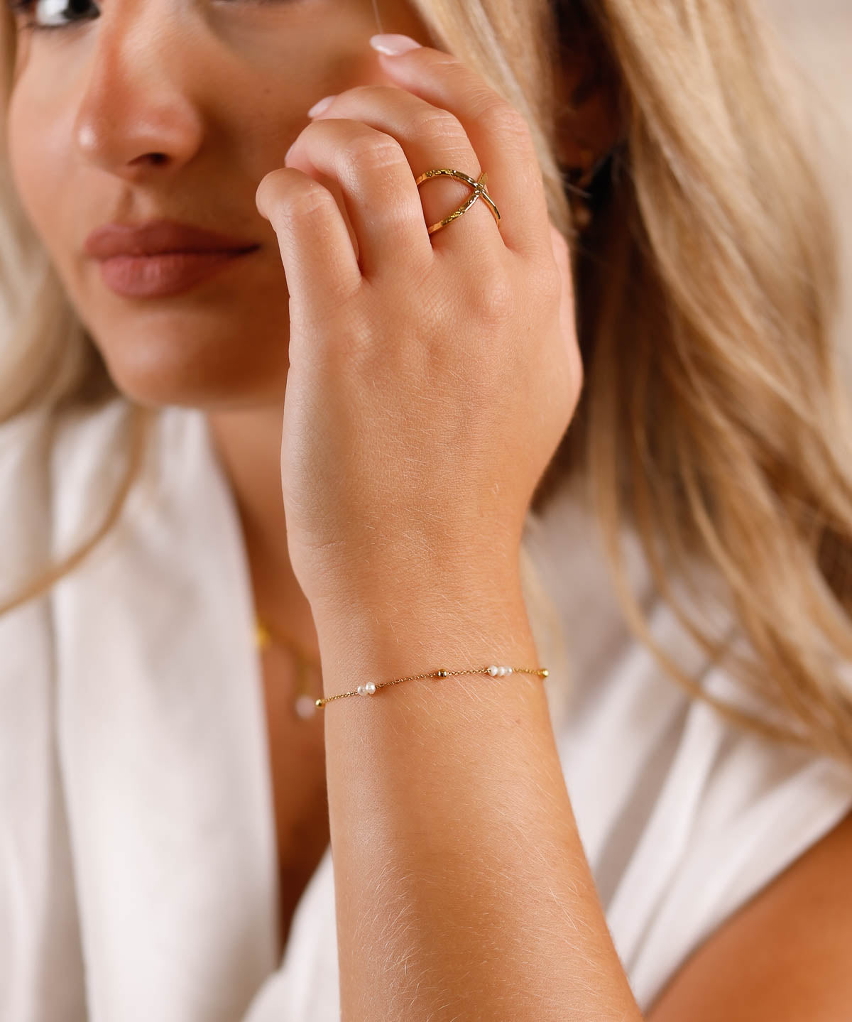 bracelet chaine en acier inoxydable et perle pour femme 
