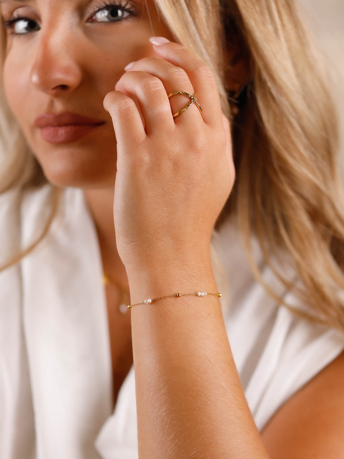 bracelet chaine en acier inoxydable et perle pour femme 