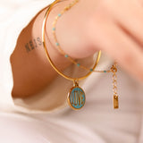 bracelet jonc en acier inoxydable avec breloque pour femme 