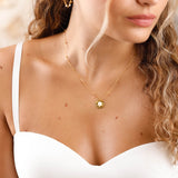 collier en acier inoxydable et fleur en nacre pour femme 