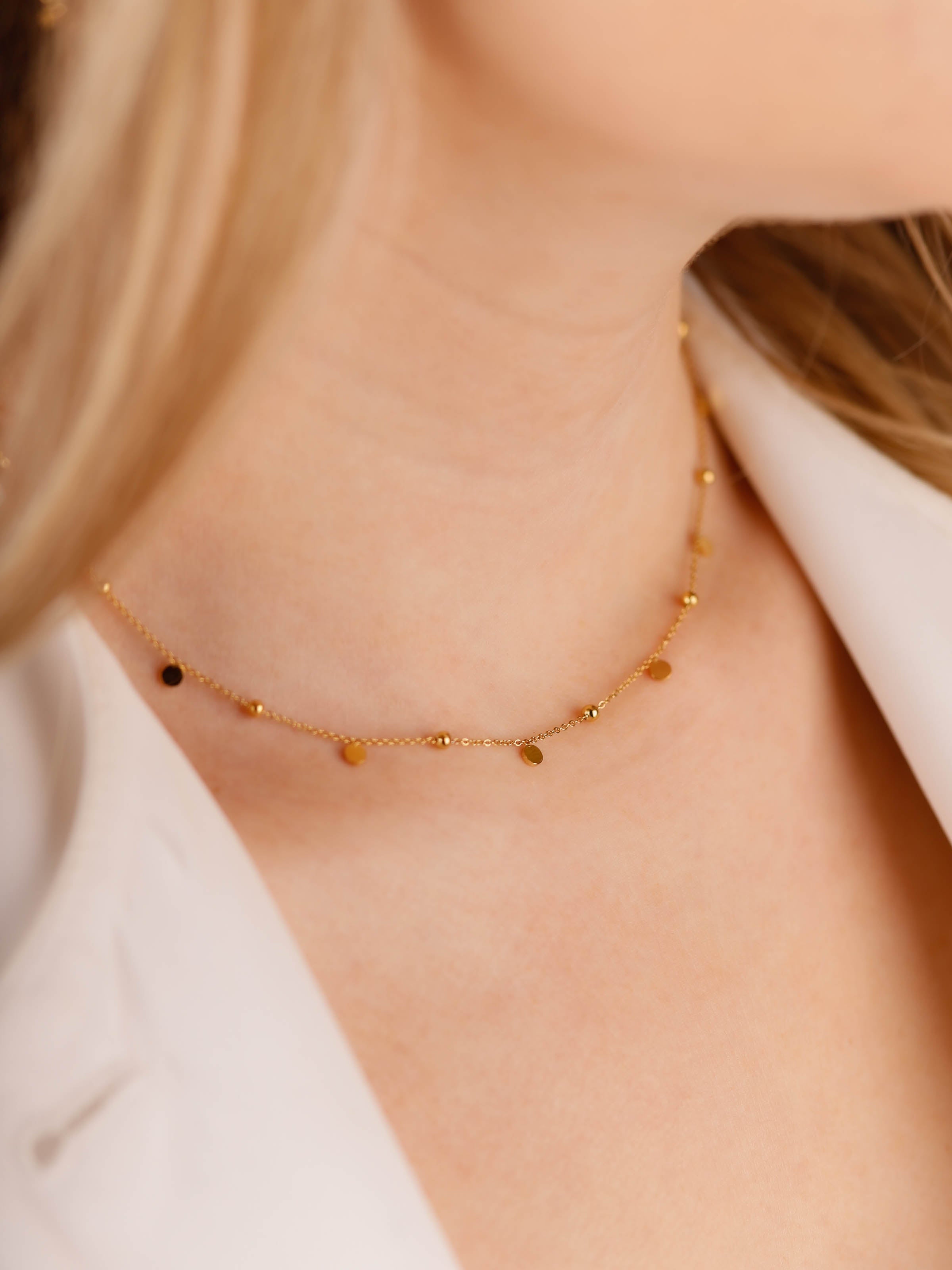 collier en acier inoxydable avec palet pour femme 
