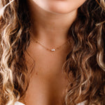 collier en acier inoxydable et perle d'eau douce pour femme 