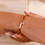 bracelet jonc en acier inoxydable et nacre pour femme 